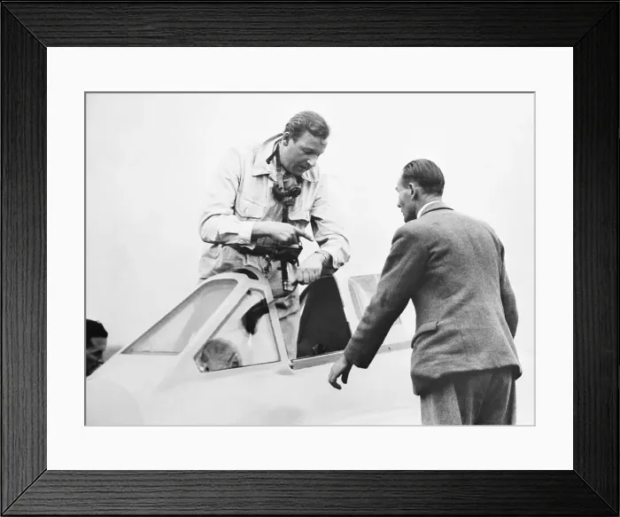 Framed Print : Geoffrey de Havilland Climbing into Plane Cockpit Framed Print : Geoffrey de Havilland Climbing into Plane Cockpit