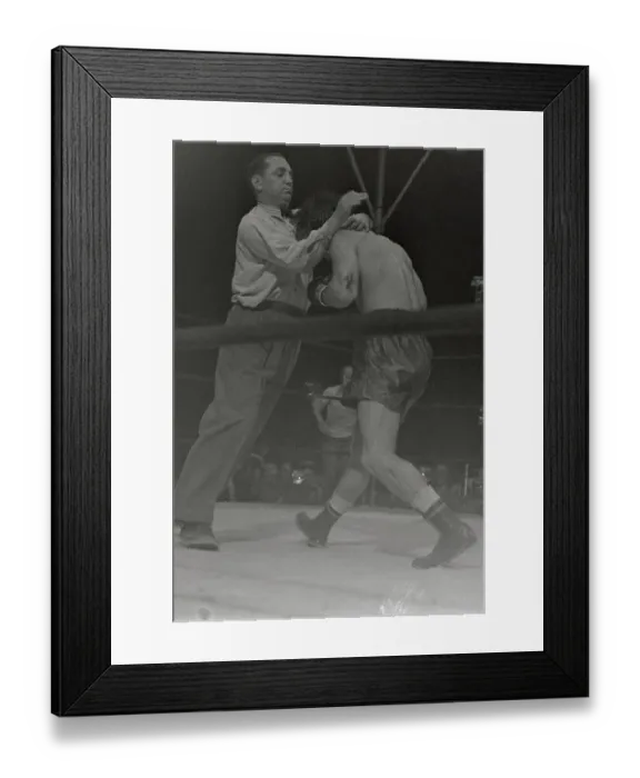 Framed Print : Referee Restraining Boxer Rocky Graziano Framed Print : Referee Restraining Boxer Rocky Graziano