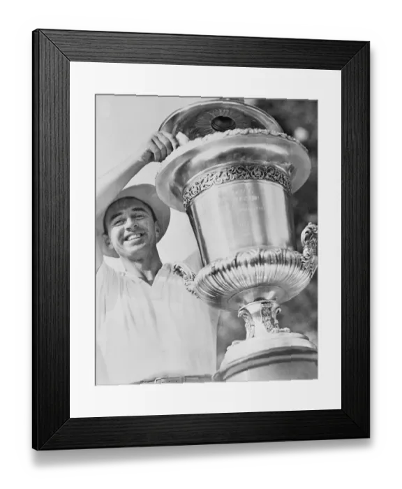 Framed Print : Sam Snead Putting Prize Check into Trophy Framed Print : Sam Snead Putting Prize Check into Trophy