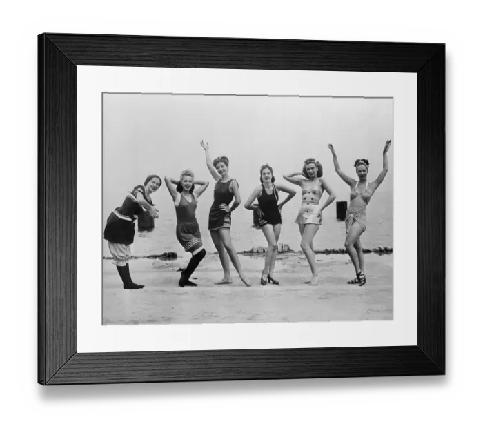 Framed Print : Women Wearing Progression of Swimsuit Styles on Beach Framed Print : Women Wearing Progression of Swimsuit Styles on Beach