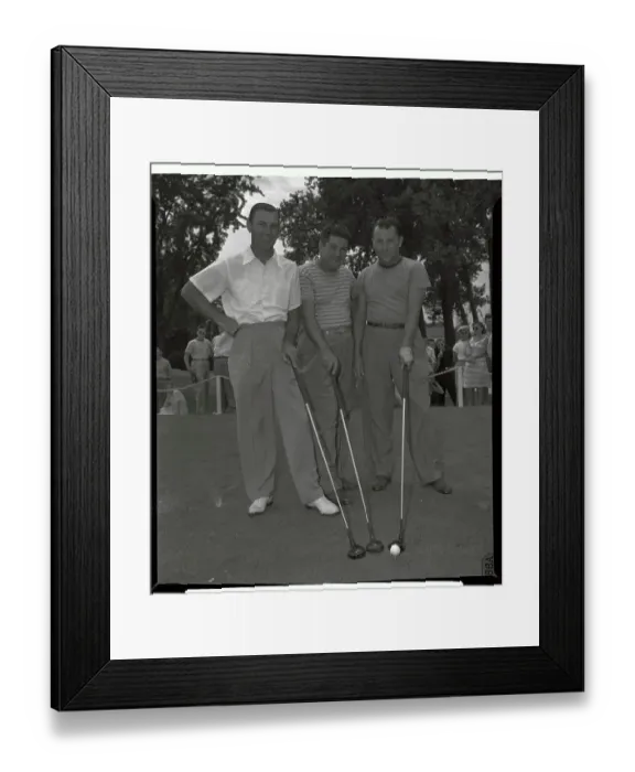 Framed Print : Golfers Standing and Holding Putters Framed Print : Golfers Standing and Holding Putters
