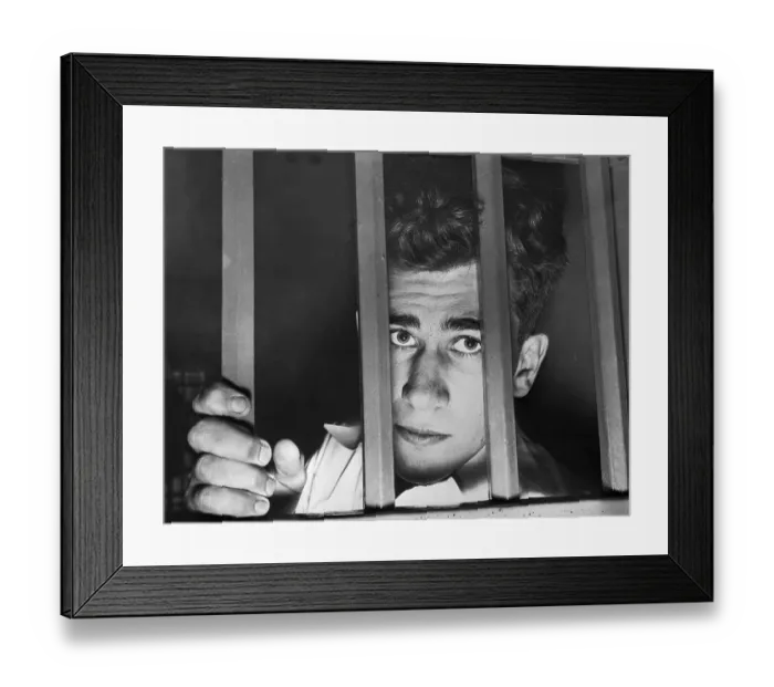 Framed Print : Murder Suspect Looking from Behind Bars Framed Print : Murder Suspect Looking from Behind Bars