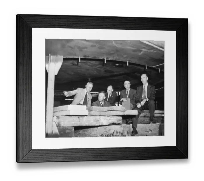 Framed Print : Physicists Examining a New Cyclotron Framed Print : Physicists Examining a New Cyclotron