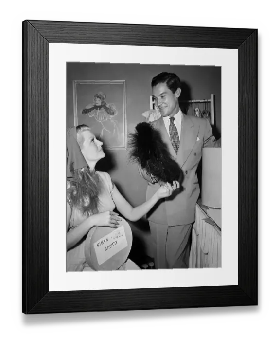 Framed Print : Costumer Presents Hats To Rita Hayworth Framed Print : Costumer Presents Hats To Rita Hayworth