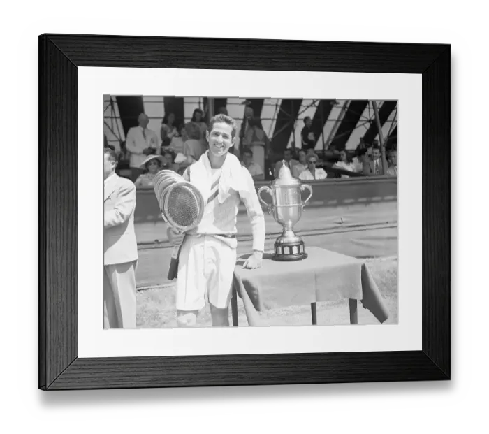 Framed Print : Bobby Riggs with Stack of Racquets Framed Print : Bobby Riggs with Stack of Racquets