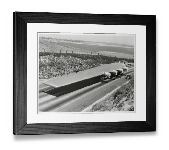 Framed Print : View of Howard Hughes Flying Boat Wing Next to Car Framed Print : View of Howard Hughes Flying Boat Wing Next to Car