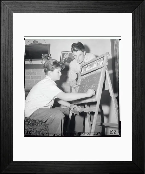 Framed Print : Boy Receiving Lessons from Adoptive Father