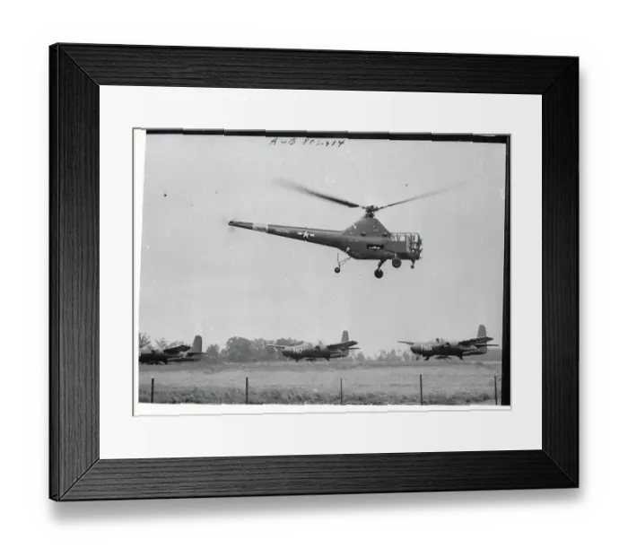 Framed Print : Army Helicopter Hovering Over Waiting Planes Framed Print : Army Helicopter Hovering Over Waiting Planes