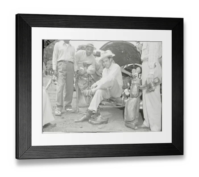 Framed Print : Joe Louis Putting on Golf Socks Framed Print : Joe Louis Putting on Golf Socks