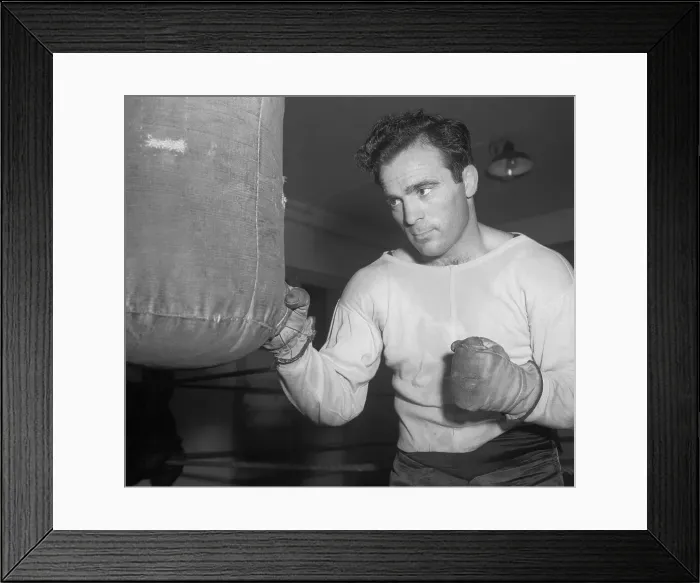 Framed Print : Marcel Cerdan Hitting a Punching Bag Framed Print : Marcel Cerdan Hitting a Punching Bag