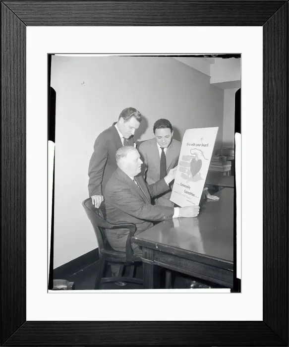 Framed Print : Nelson Rockefeller Reading A Poster Framed Print : Nelson Rockefeller Reading A Poster