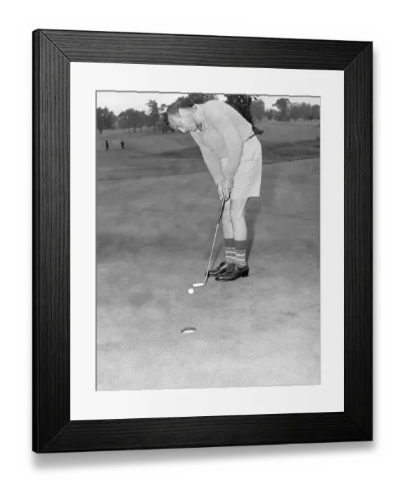 Framed Print : Vic Ghezzi in Shorts and Socks Putting