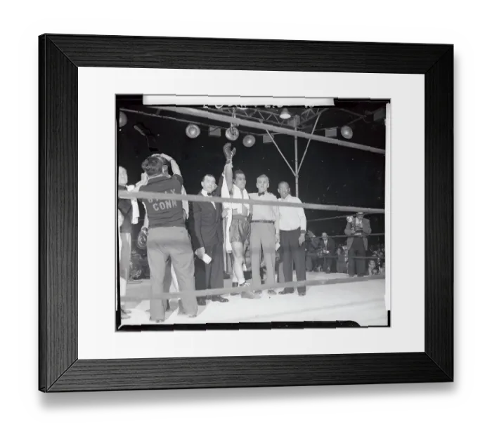 Framed Print : Referee Raising Hand of Joe Louis After Victory Framed Print : Referee Raising Hand of Joe Louis After Victory
