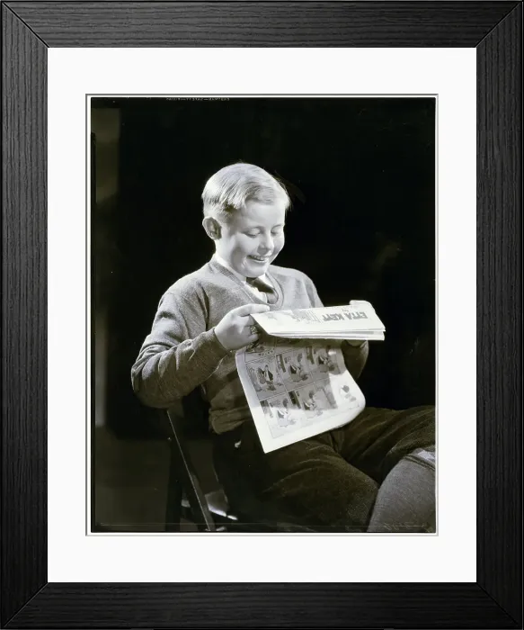 Framed Print : Boy Reading Comics Framed Print : Boy Reading Comics