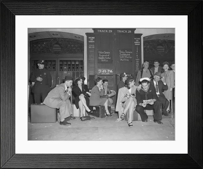 Framed Print : Stranded Passengers Sit On Luggage Framed Print : Stranded Passengers Sit On Luggage