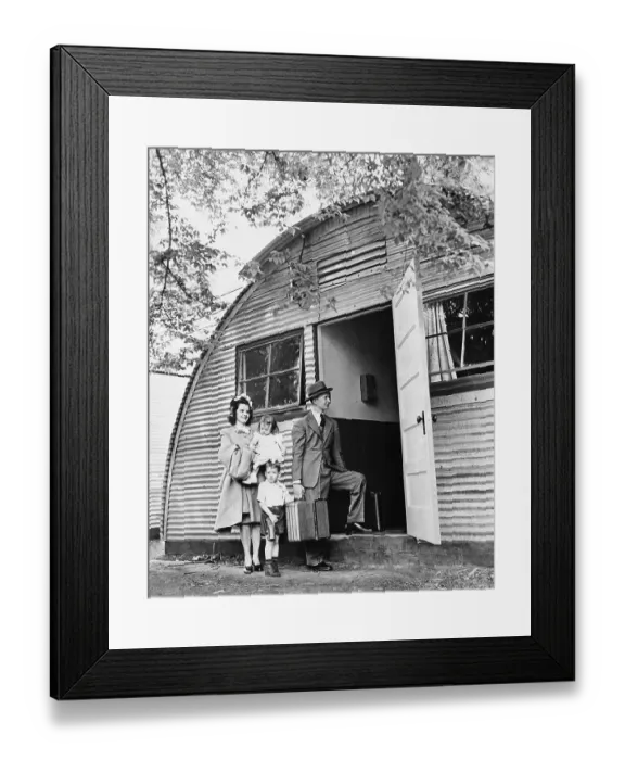 Framed Print : Family Move Into Hut-Like House Framed Print : Family Move Into Hut-Like House