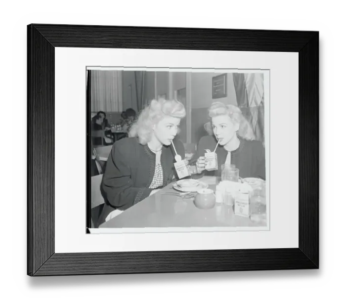 Framed Print : Twin Sister Actresses Drinking Beverages Framed Print : Twin Sister Actresses Drinking Beverages