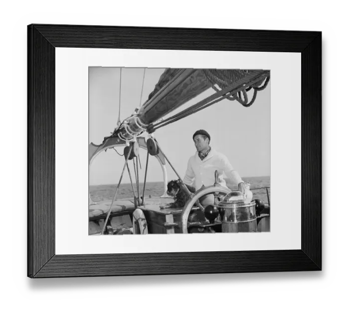 Framed Print : Errol Flynn at Helm of His New Boat Framed Print : Errol Flynn at Helm of His New Boat