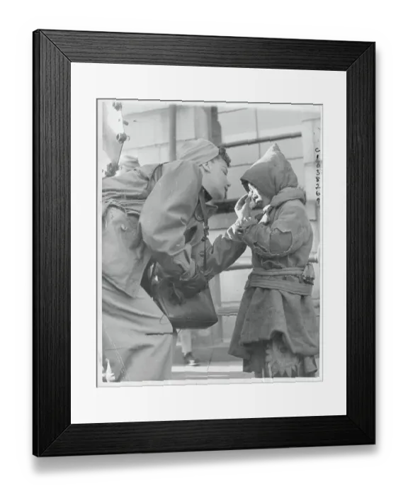 Framed Print : Red Cross Worker Wiping Boy's Tears Framed Print : Red Cross Worker Wiping Boy's Tears