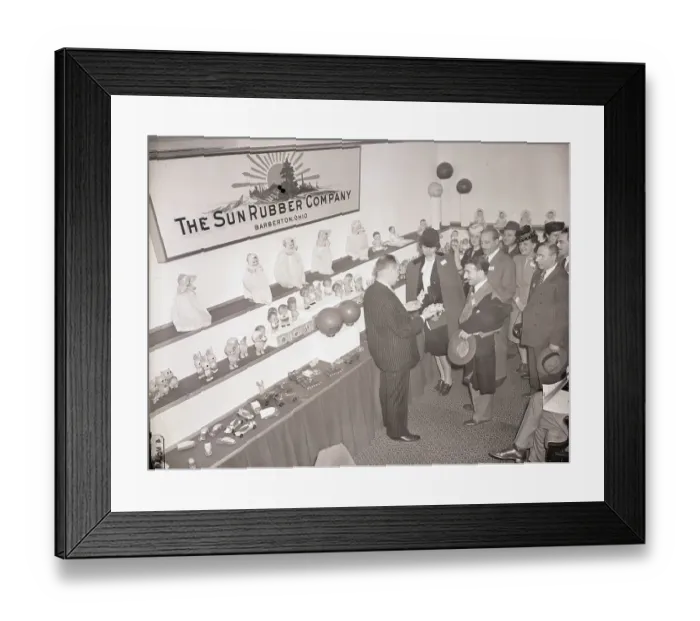 Framed Print : Buyers Examining Toys at Toy Fair Framed Print : Buyers Examining Toys at Toy Fair