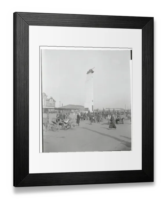 Framed Print : People Walking Past Monument Framed Print : People Walking Past Monument