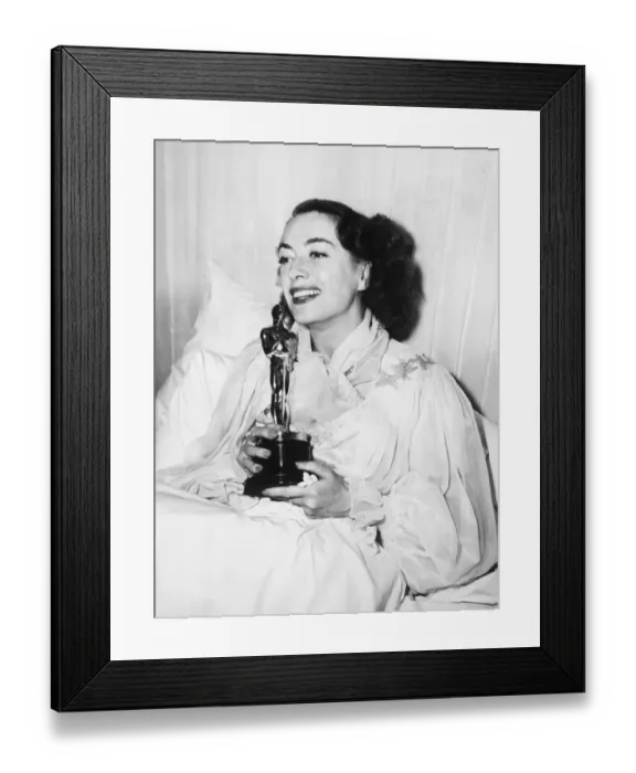 Framed Print : Joan Crawford Holding Academy Award Framed Print : Joan Crawford Holding Academy Award