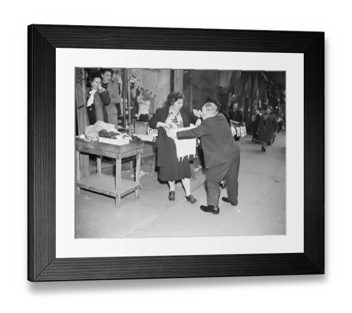 Framed Print : Man Selling Girdle to Woman on Sidewalk Framed Print : Man Selling Girdle to Woman on Sidewalk