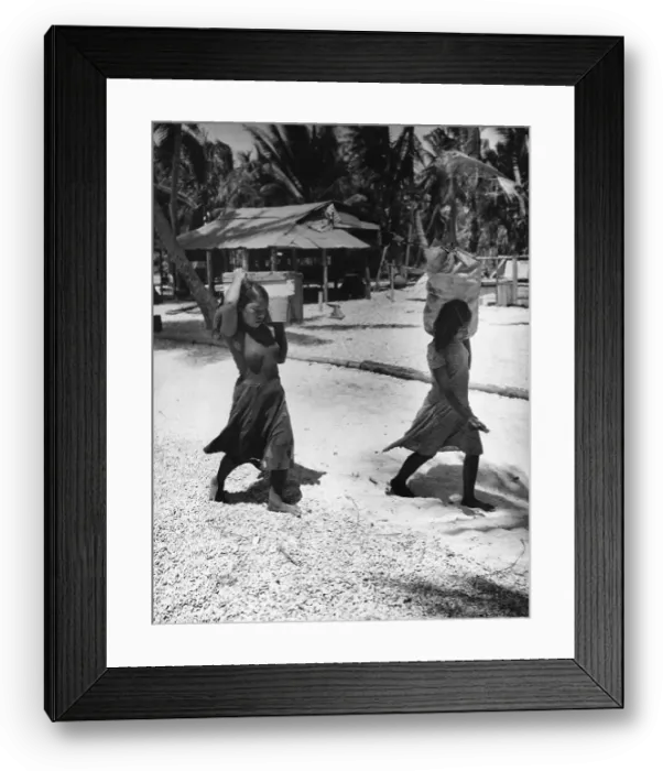 Framed Print : Girls Carrying Their Possessions Framed Print : Girls Carrying Their Possessions