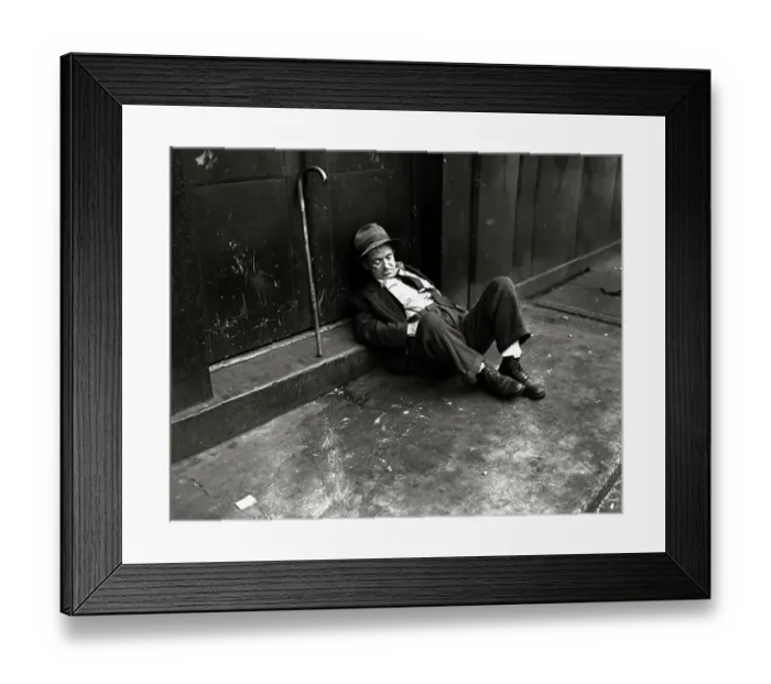 Framed Print : Homeless Man Sleeping on a Sidewalk Framed Print : Homeless Man Sleeping on a Sidewalk