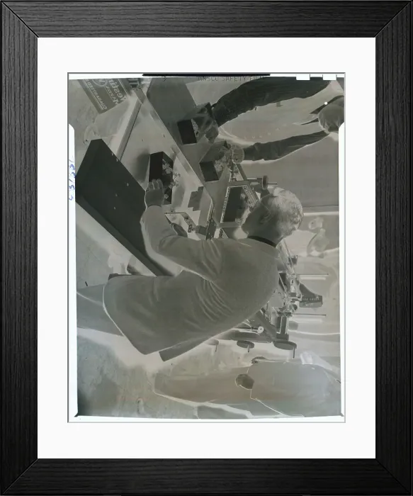 Framed Print : Man Examining Chicken-Wrapper Framed Print : Man Examining Chicken-Wrapper