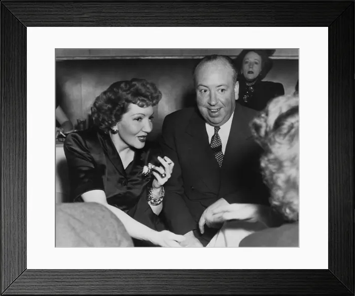 Framed Print : Claudette Colbert and Alfred Hitchcock at the Stork Club Framed Print : Claudette Colbert and Alfred Hitchcock at the Stork Club
