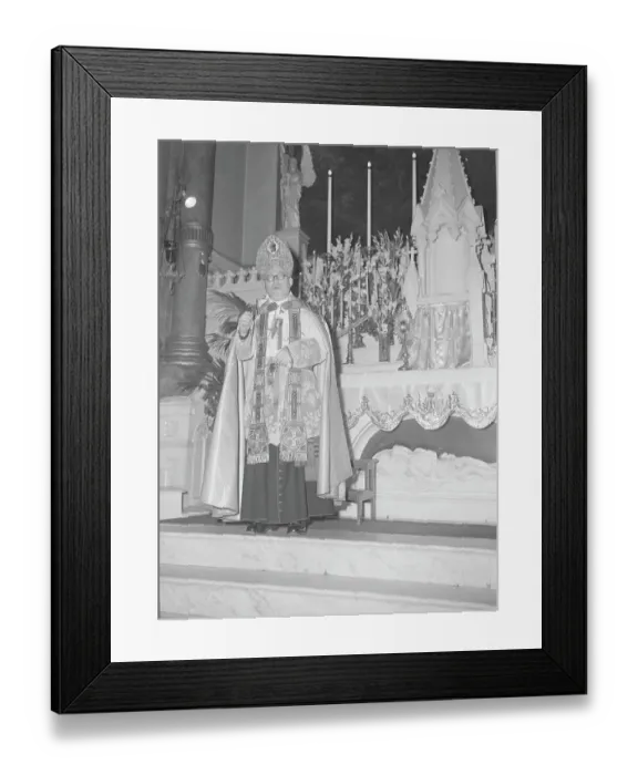 Framed Print : Reverend Thomas Tien Celebrating Mass