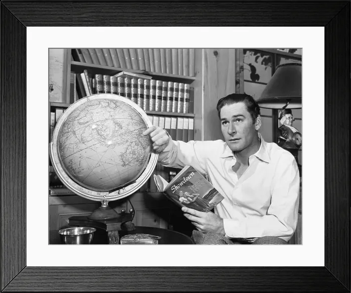 Framed Print : Errol Flynn Observing Globe Framed Print : Errol Flynn Observing Globe