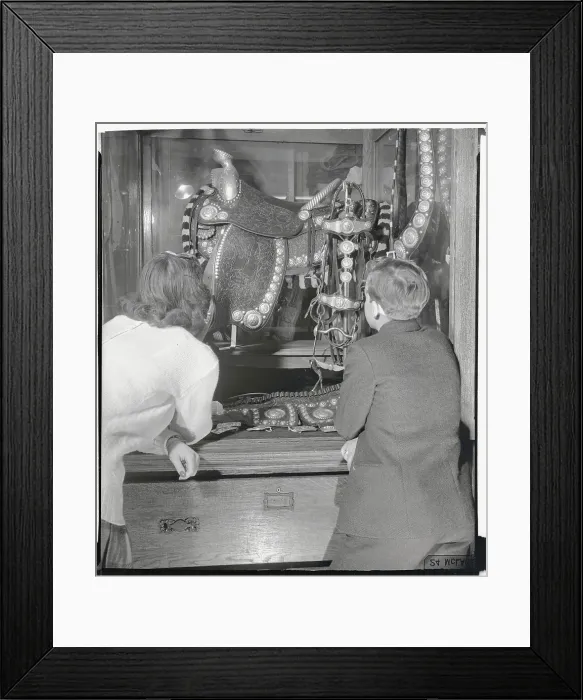 Framed Print : Two Youngsters Admiring Ornate Saddle Framed Print : Two Youngsters Admiring Ornate Saddle