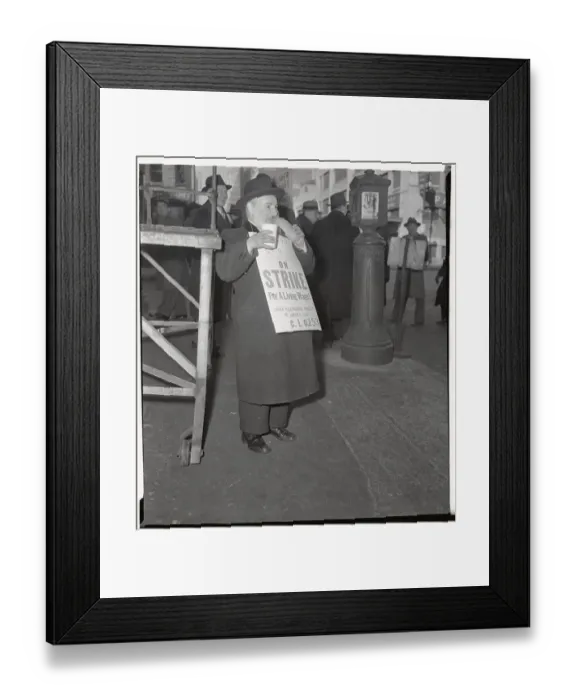 Framed Print : Man Eating Lunch While Picketing Framed Print : Man Eating Lunch While Picketing