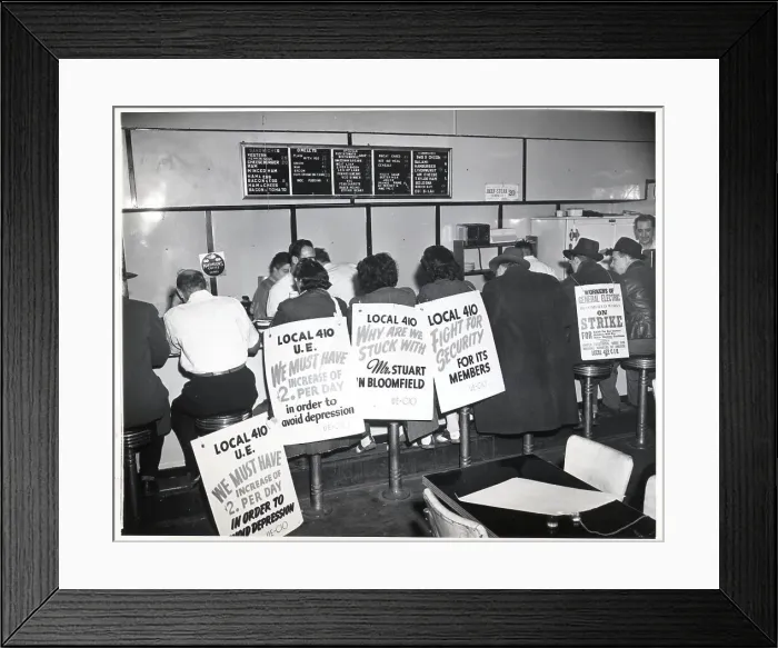 Framed Print : Strikers with Picket Signs Eat at Diner Framed Print : Strikers with Picket Signs Eat at Diner