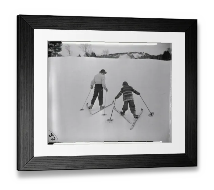 Framed Print : Youngsters Walking up Slope on Their Skis Framed Print : Youngsters Walking up Slope on Their Skis