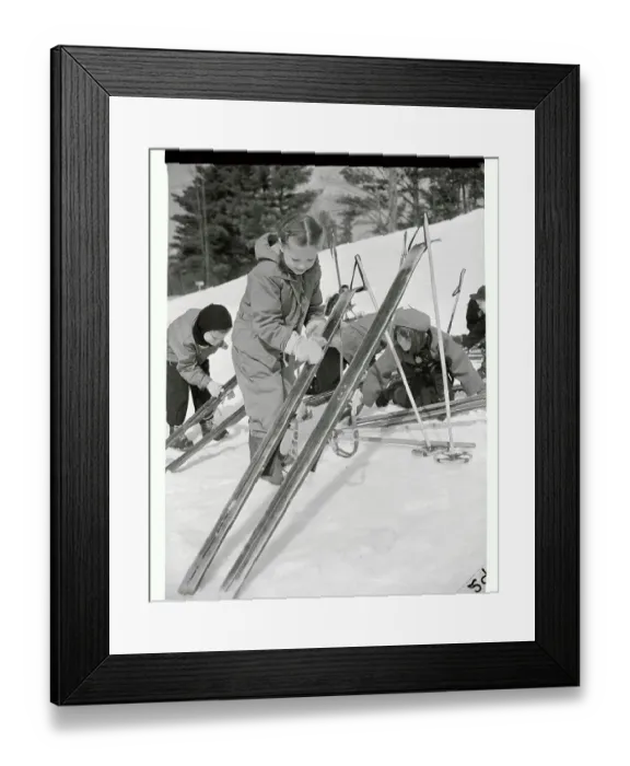 Framed Print : Girl Waxing Her Skis Framed Print : Girl Waxing Her Skis