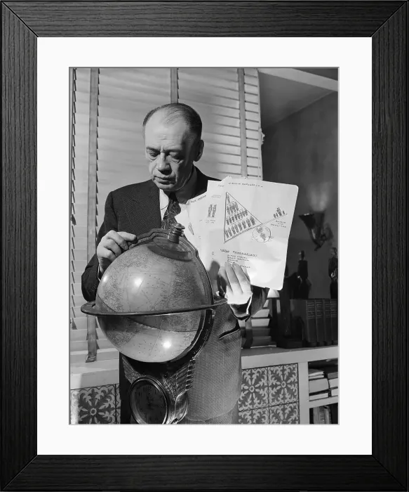 Framed Print : Ely Culbertson Studying Globe and Charts Framed Print : Ely Culbertson Studying Globe and Charts
