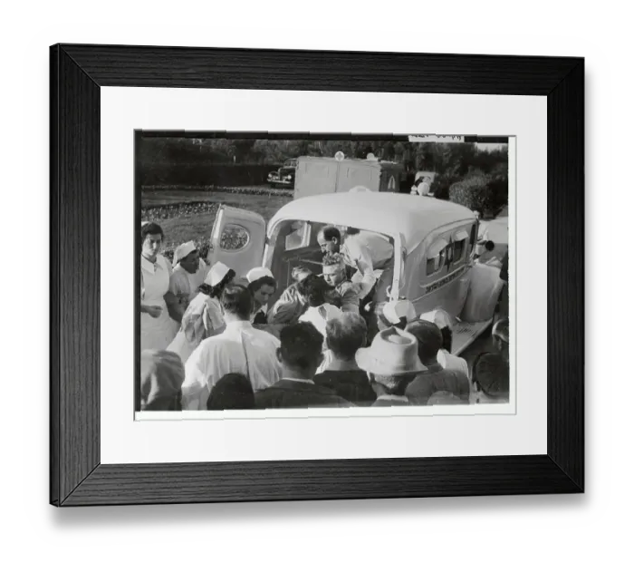 Framed Print : Medics Removing Wounded Man from Ambulance Framed Print : Medics Removing Wounded Man from Ambulance