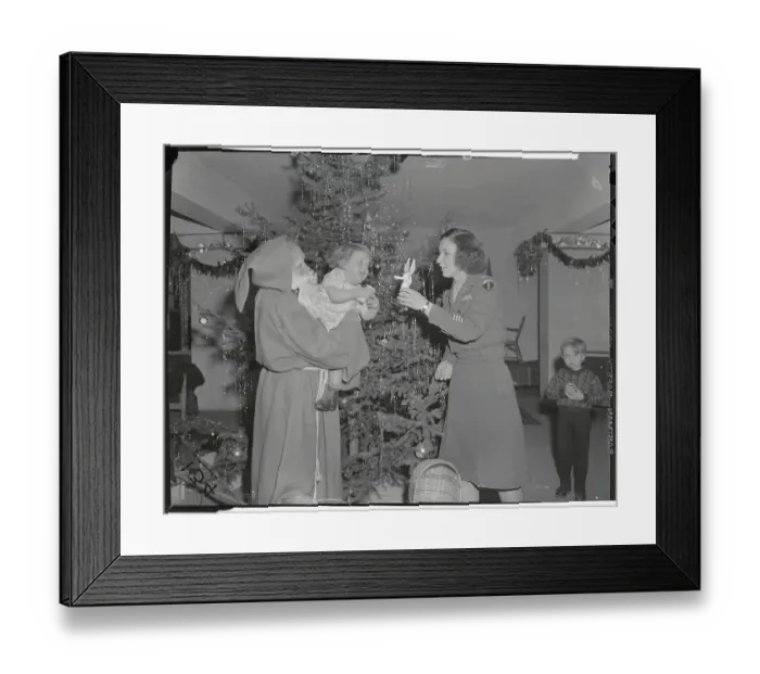 Framed Print : WACs Playing Santa for Displaced Child Framed Print : WACs Playing Santa for Displaced Child