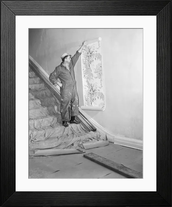 Framed Print : Painter Holding Wallpaper in Gracie Mansion Framed Print : Painter Holding Wallpaper in Gracie Mansion