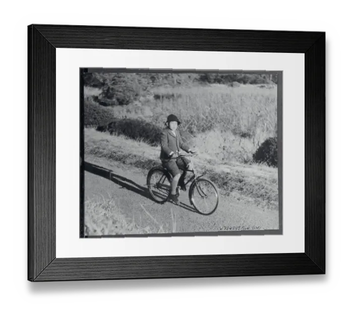 Framed Print : Crown Prince Akihito Riding Bicycle on Palace Grounds