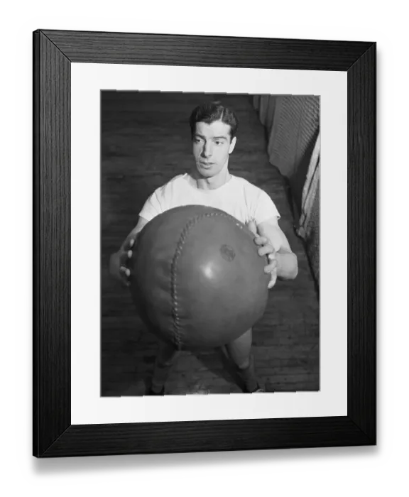 Framed Print : Joe DiMaggio Holding Medicine Ball Framed Print : Joe DiMaggio Holding Medicine Ball