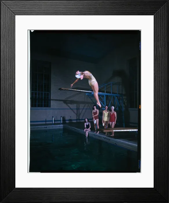 Framed Print : Woman Diving Backwards off Board Framed Print : Woman Diving Backwards off Board