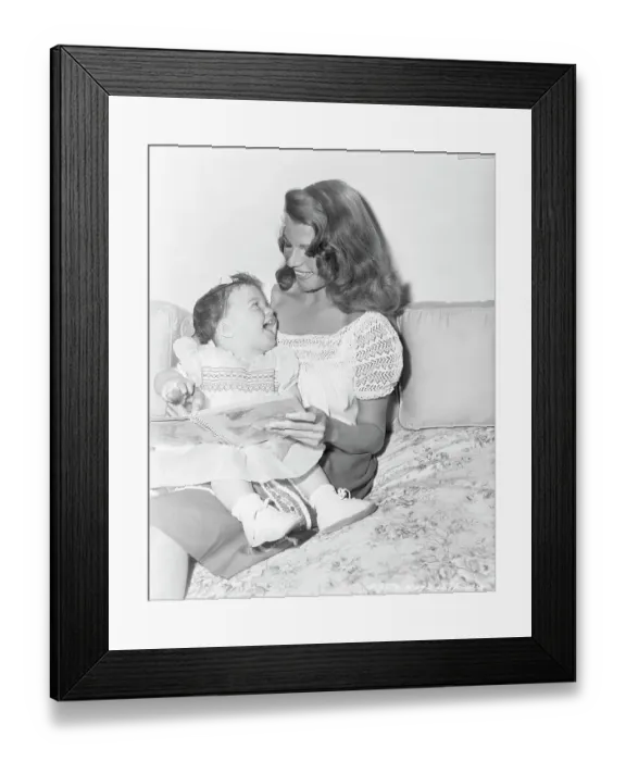Framed Print : Rita Hayworth Reading to Daughter Framed Print : Rita Hayworth Reading to Daughter