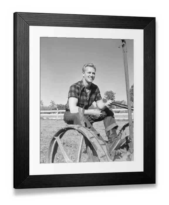 Framed Print : Actor Sterling Hayden Driving Farm Machinery Framed Print : Actor Sterling Hayden Driving Farm Machinery