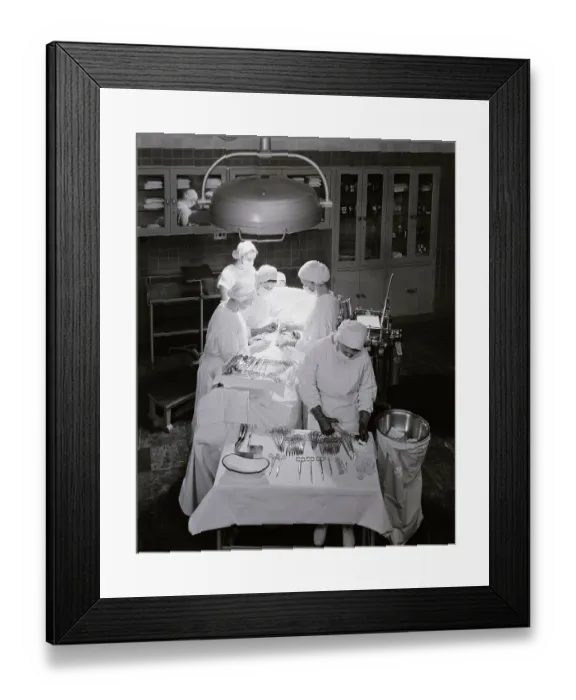 Framed Print : Hospital Scene Woman Surgeon Operating Framed Print : Hospital Scene Woman Surgeon Operating