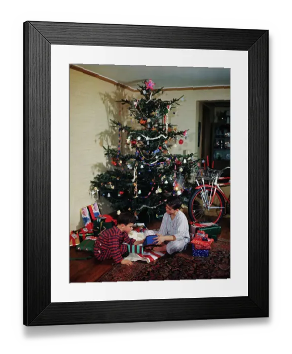 Framed Print : Boys Discussing Toy Underneath Tree Framed Print : Boys Discussing Toy Underneath Tree