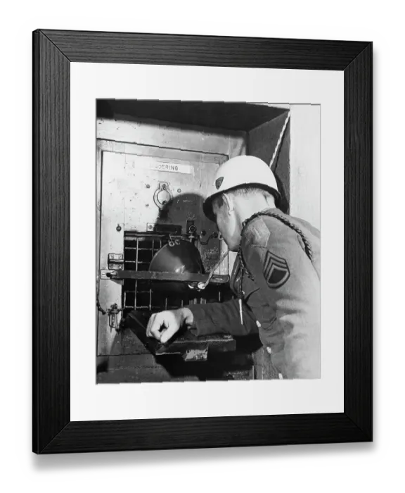 Framed Print : Soldier Peering into Goering's Cell Framed Print : Soldier Peering into Goering's Cell